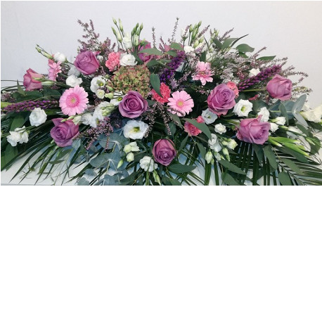 Centro funerario de flores variadas rosa